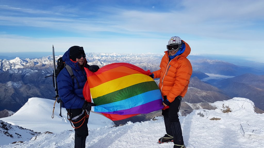 Pink Summits - rainbow flag on Elbrus