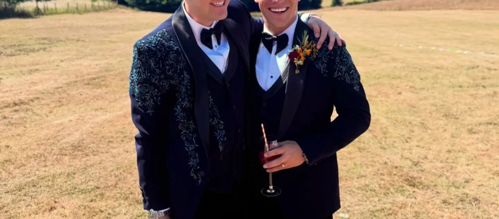 Kyle Tayler-Woolston mit seinem Ehemann George bei ihrer Hochzeit
