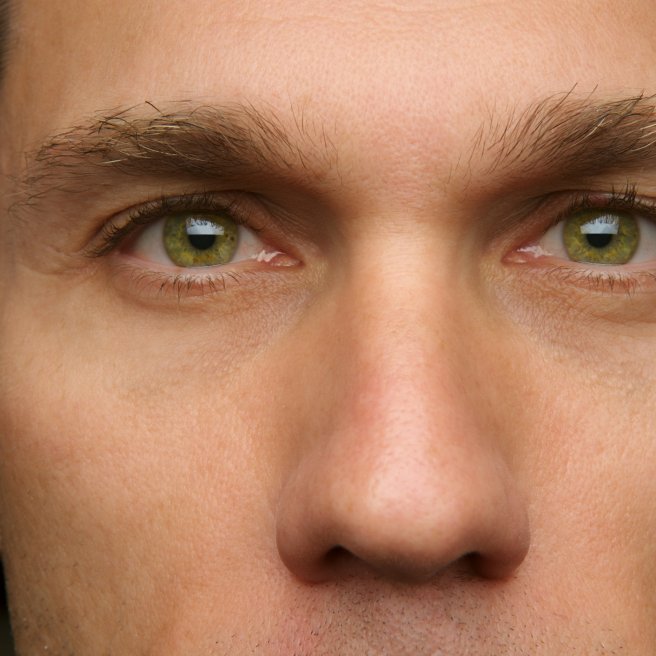 Mann mit grünen Augen