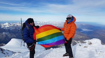 Pink Summits - rainbow flag on Elbrus